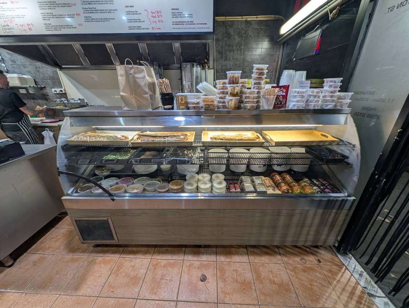 The dips cabinet and counter inside the shop